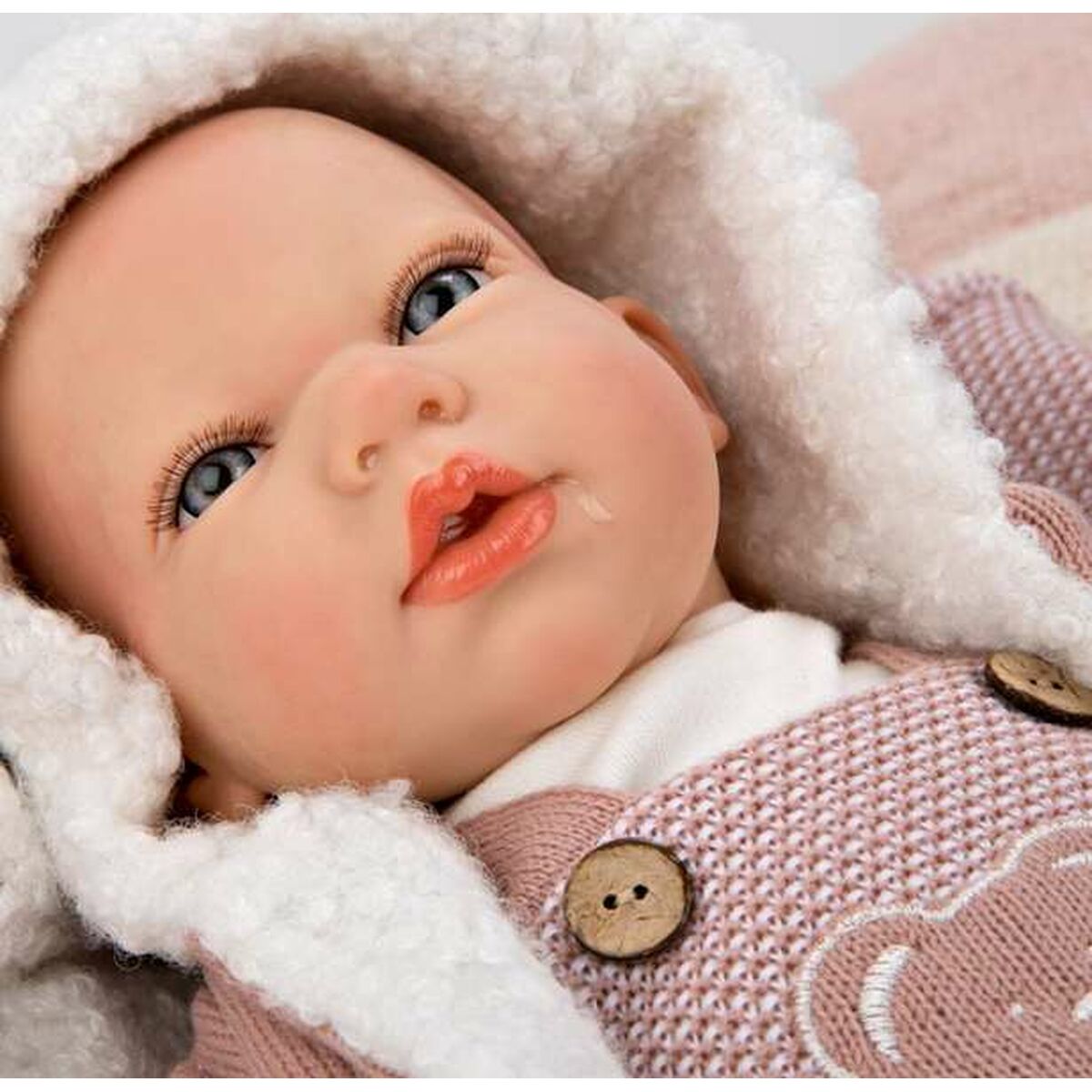 Reborn-nukke 40 cm, realistinen vauvanukke vaaleanpunaisessa puvussa ja viltti