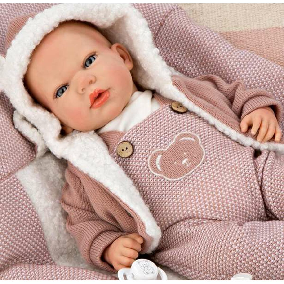 Reborn-nukke 40 cm, realistinen vauvanukke vaaleanpunaisessa puvussa ja viltti